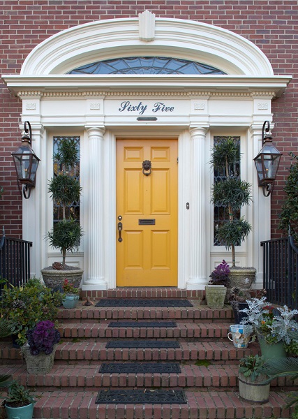 Best Philadelphia interior designer Glenna Stone yellow front door Traditional Home