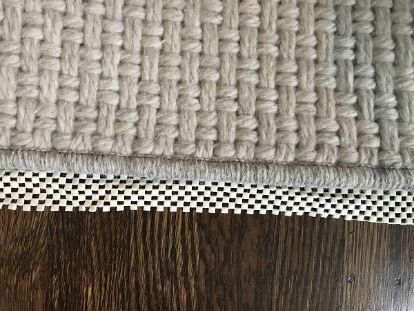 Philadelphia interior designer Glenna Stone how to lay a rug pad 7