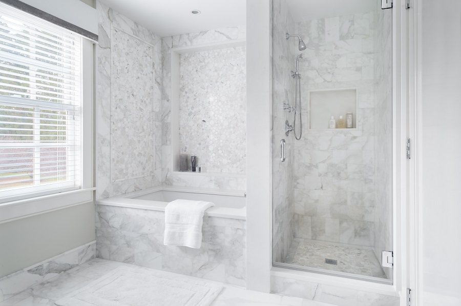 Best Philadelphia interior designer Glenna Stone Wynnewood bedroom renovation en suite bathroom tub and shower
