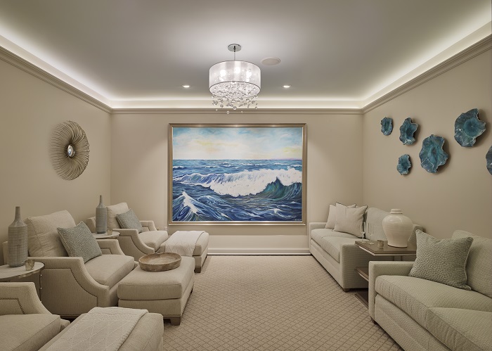 Spa relaxation room with seating and artwork